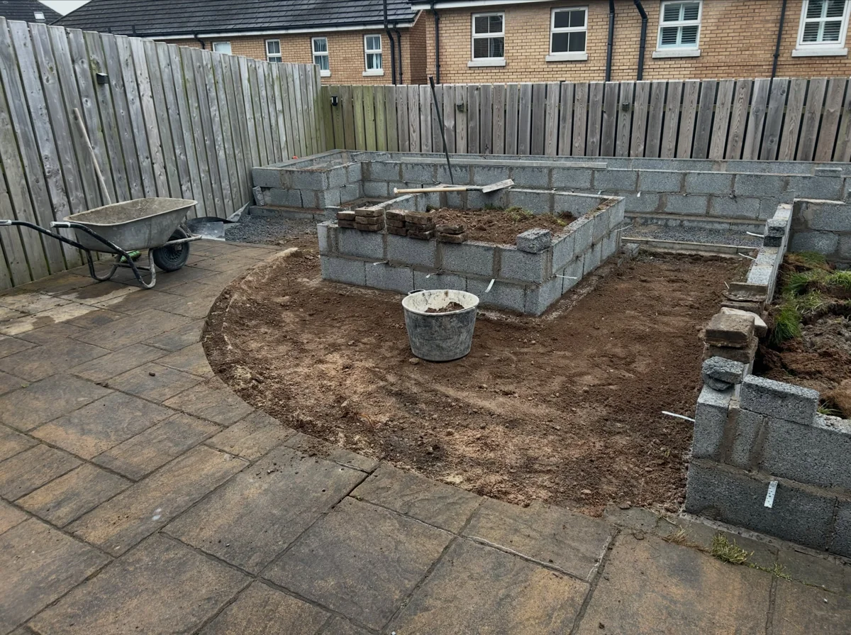 Work in progress: Stephen’s raised garden beds being built in blockwork before the brick finish